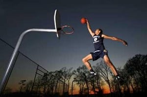 woman dunking a basketball