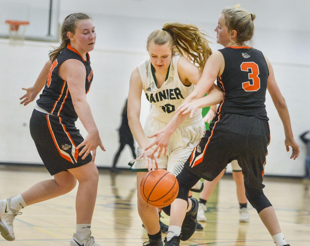 Prep Basketball Rainier boys dominate new league opponent; girls fall