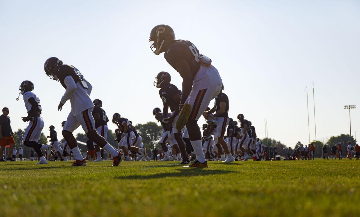 The Chicago Bears warm up during training camp on July 28, 2019.