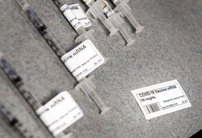 COVID-19 vaccine syringes