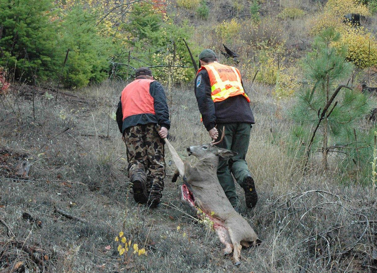 Game warden's busy day Reporter follows 'hunting cop' on Day 2 of