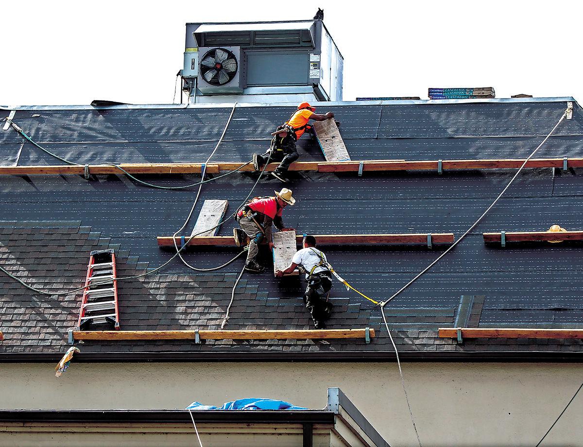 News Photo: Roofing project underway at YMCA | Local | tdn.com