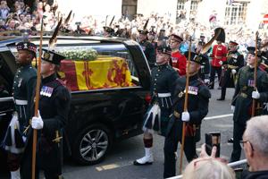 Scottish service hails queen as 'constant in all our lives.' Live coverage here