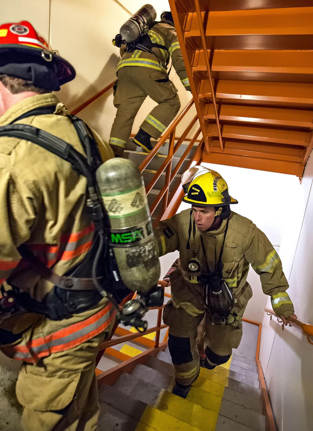 Longview firefighters practice for Scott Firefighter Stairclimb, raise