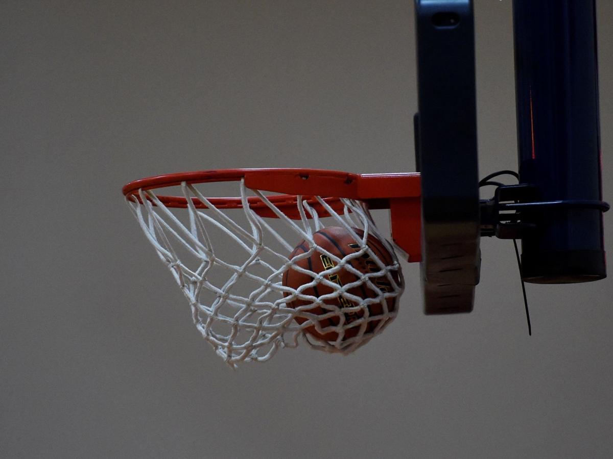 Basketball stock ball in net