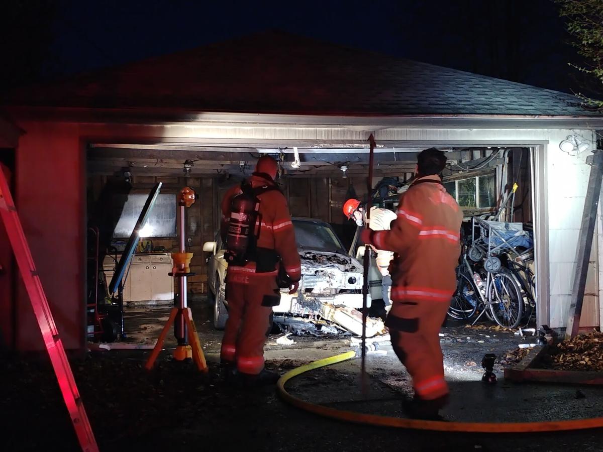 Car damaged in garage fire in Longview