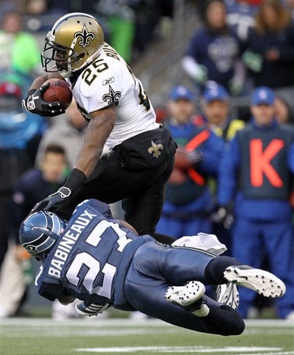 New Orleans Saints' Darren Sharper (42) and Roman Harper (41