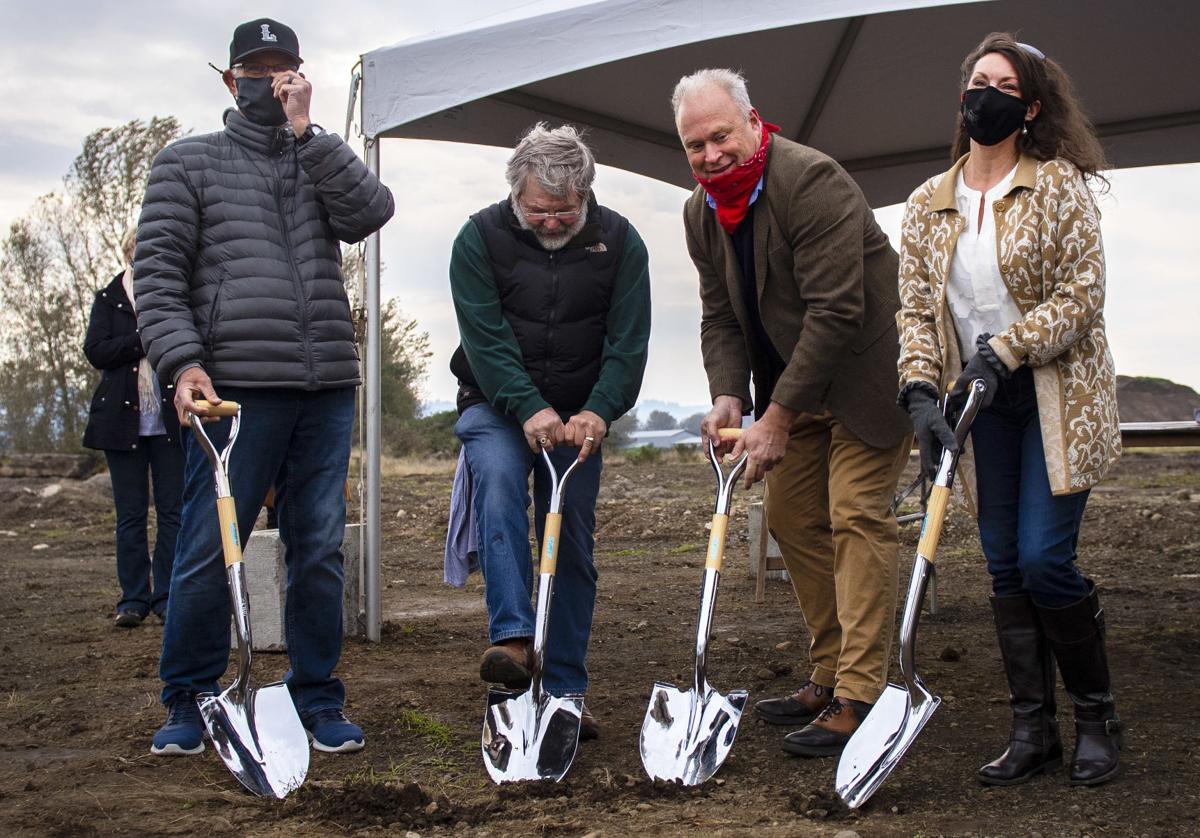 Private investors, Longview officials break ground on indoor shooting range