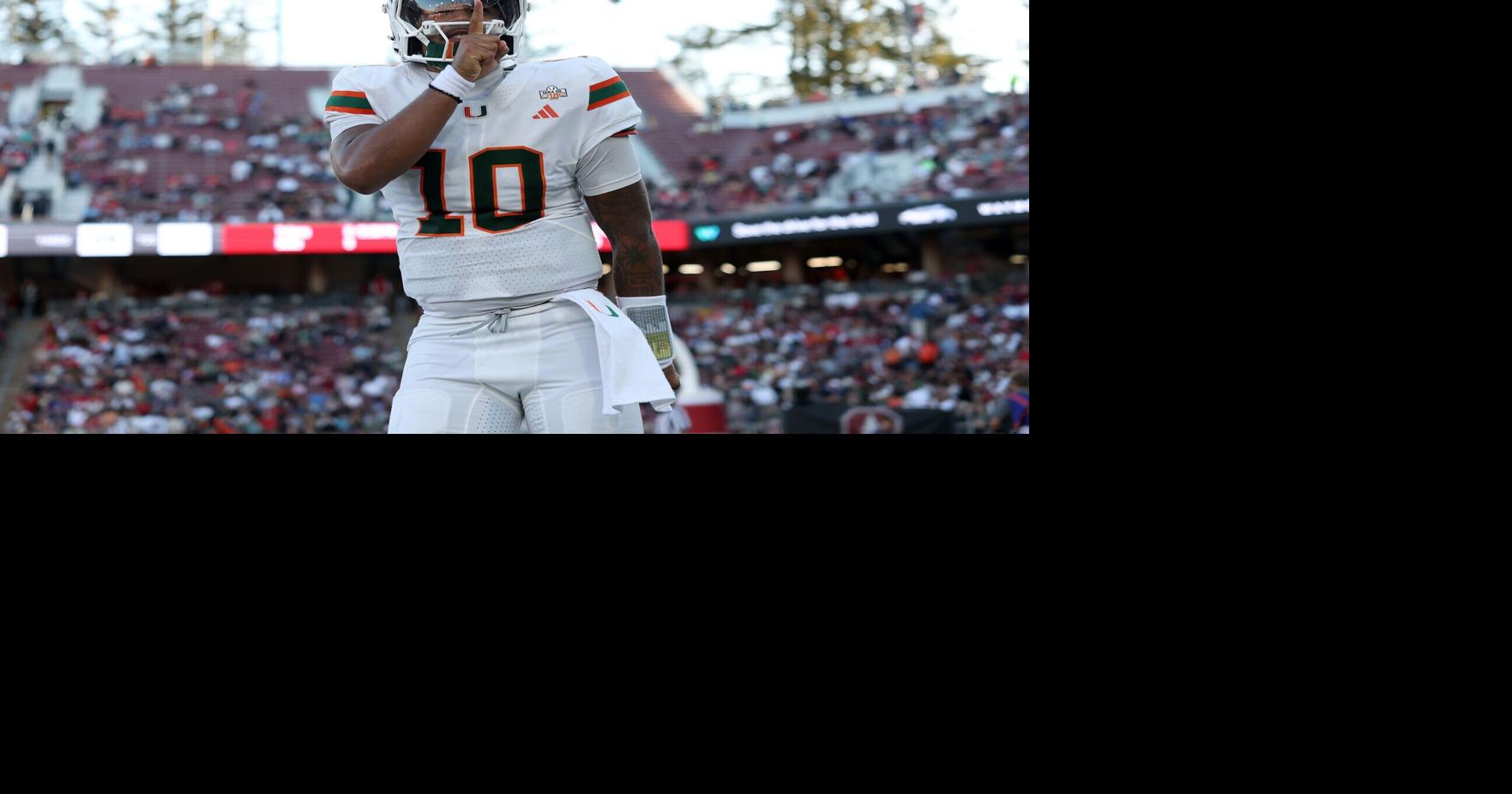 Miami quarterback Darian Mensah celebrates after the Hurricanes scored against Stanford in the first half at Stanford Stadium on Friday, Sept. 4, 2026, in Stanford, California.