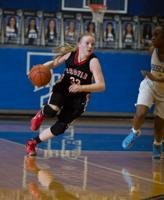 Three generations hit the 1,000-point mark on basketball court