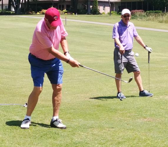 Village golfers tee off for vision