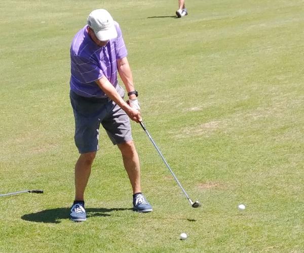 Village golfers tee off for vision