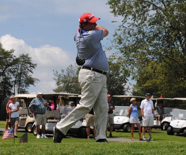 Village pros play for charity