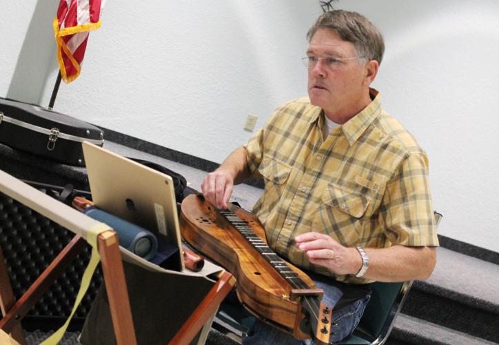 Dulcimer Club social, focused on fun