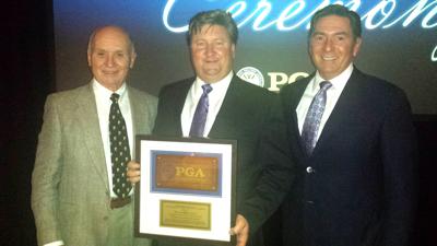 Villager celebrates son's golf success