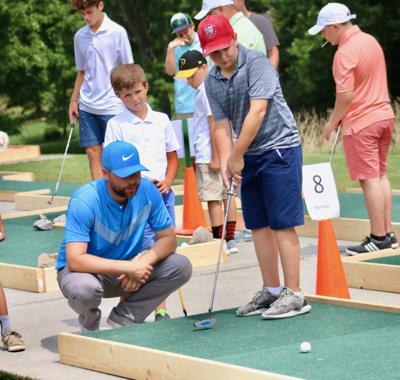 Young golfers learn the game