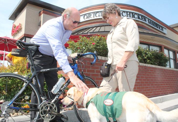 Pastor biking for veterans