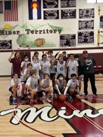 Middle school basketball team wins league championship