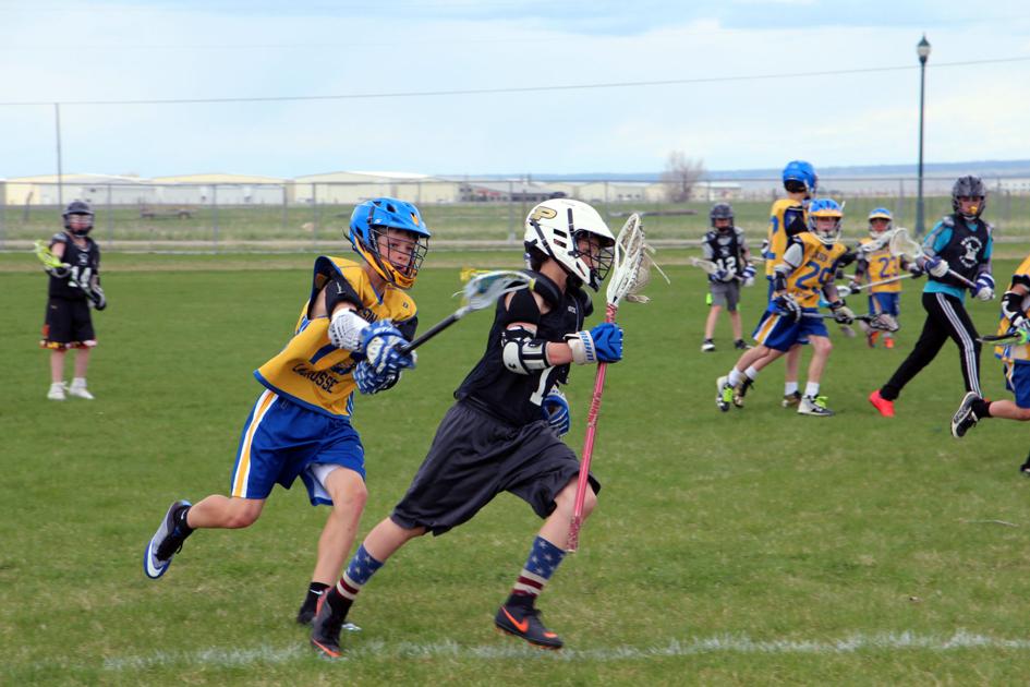 Youth lacrosse teams halfway through season Recreation