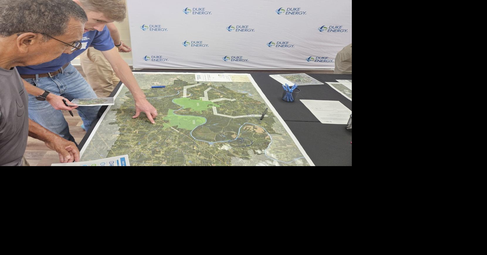 Inside the meeting, outside the protest: Debate grows over Davie-Davidson Energy Complex