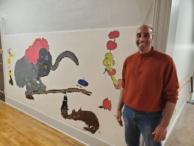 Info sought about mural uncovered at old Grimes School Apartments in