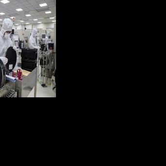 US slams China policies on chips but will delay tariffs to 2027