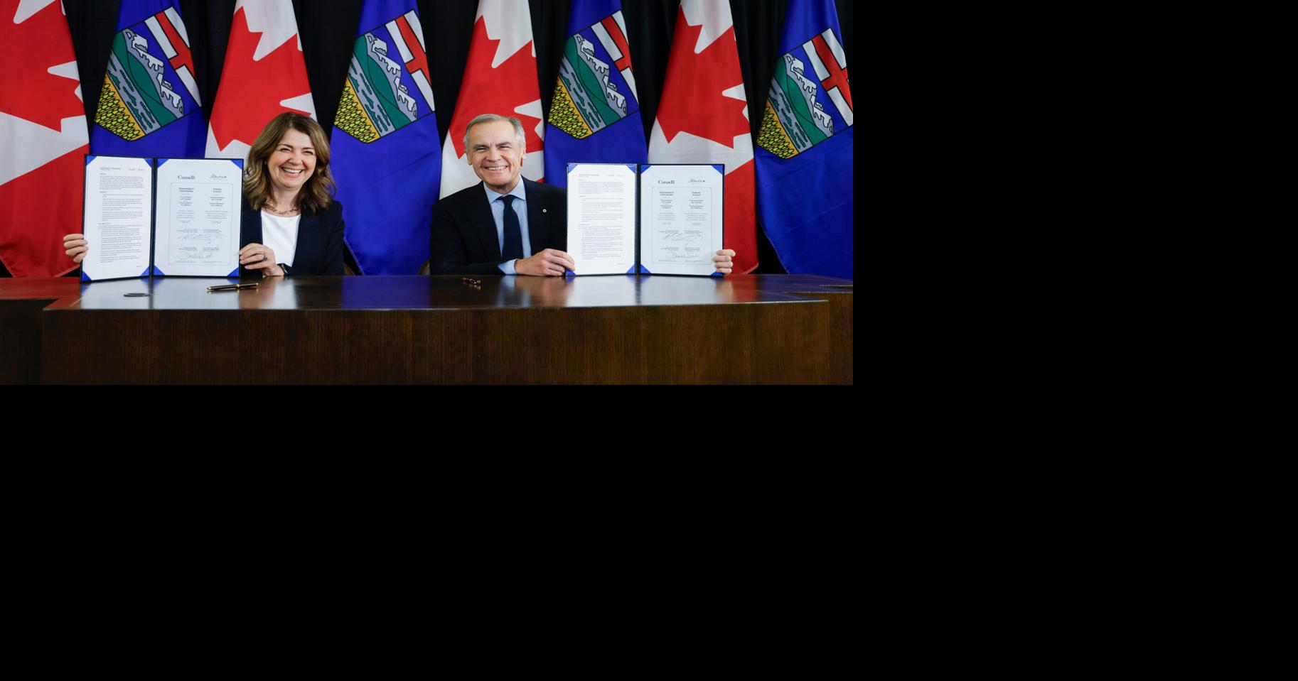 Canada's prime minister and Alberta's premier sign pipeline deal which could reverse oil tanker ban