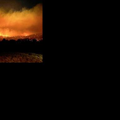 'Hectic' bushfires threaten rural towns in Australian heatwave