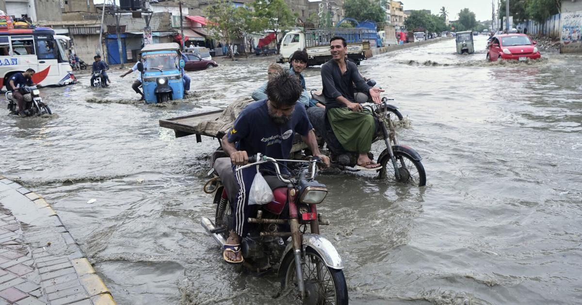 Pakistan restores electricity and reopens roads in areas where floods killed over 300