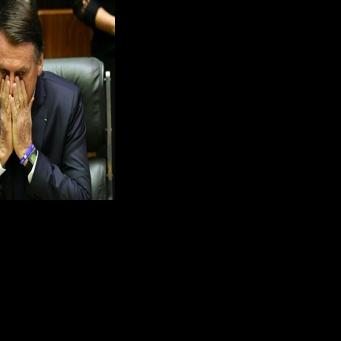 Brazil's Bolsonaro begins 27-year jail term for coup bid