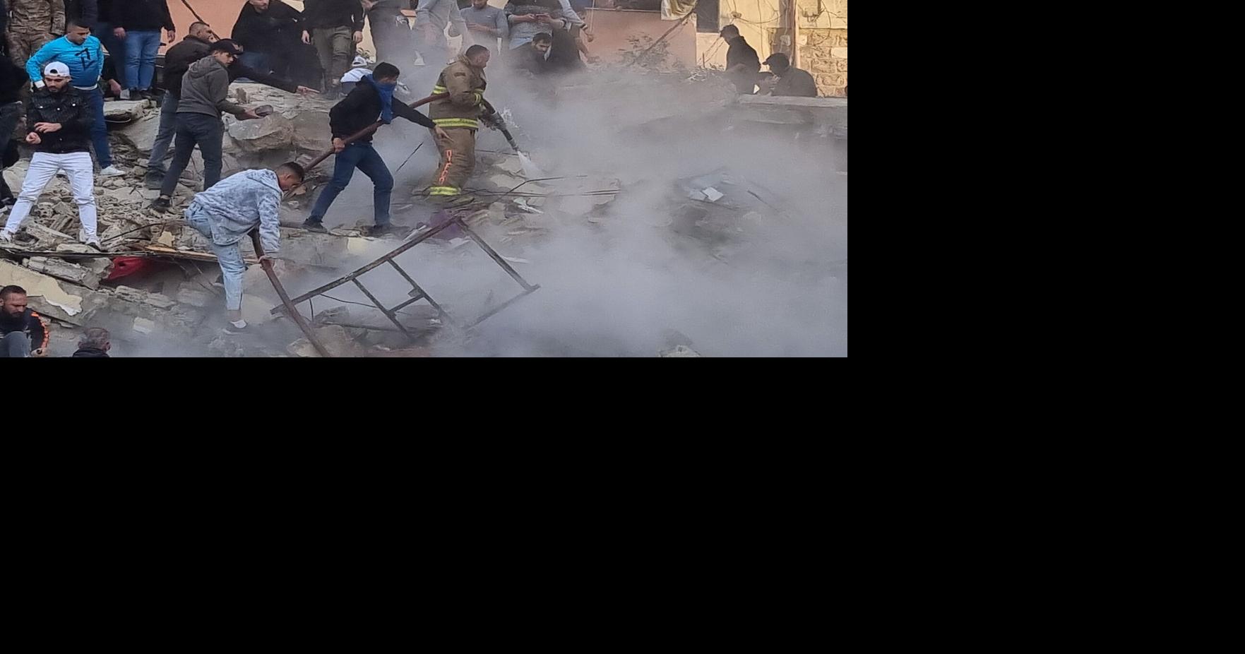 Rescue teams search for survivors in building collapse that killed at least 2 in northern Lebanon