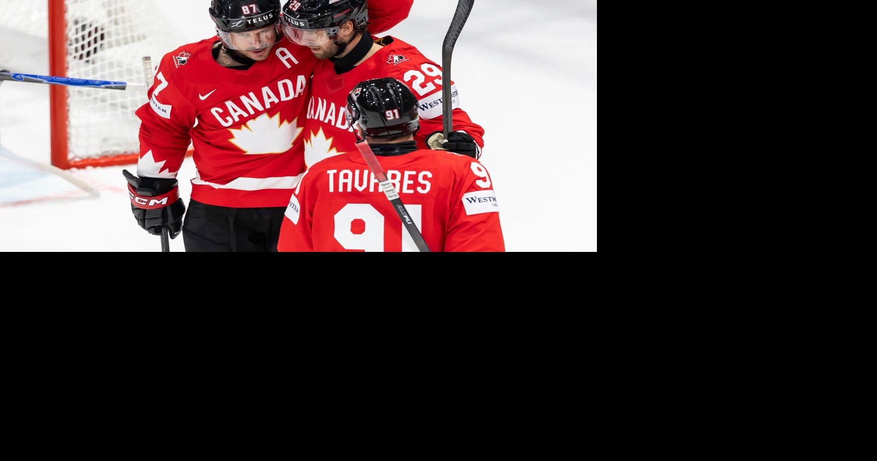 Canada beats Denmark and Crosby tallies 4 assists in third-period surge at hockey worlds