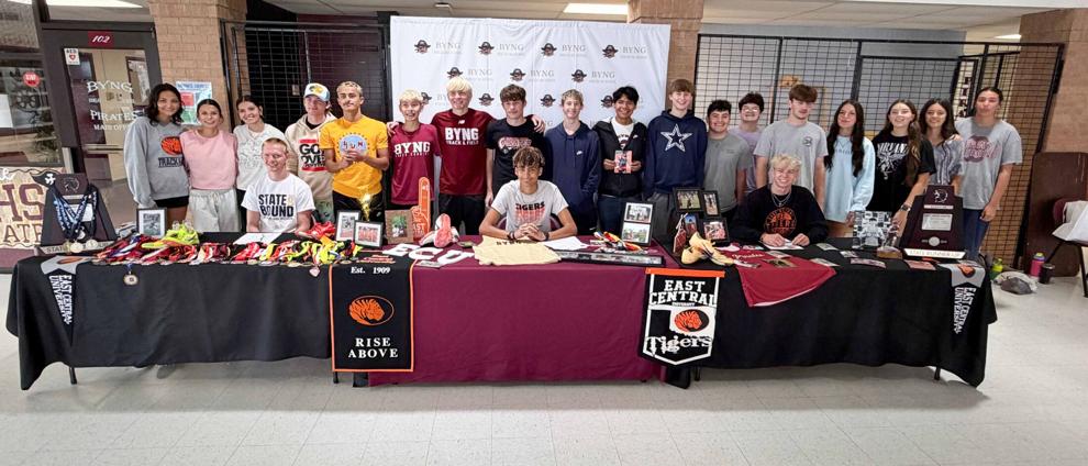 Three Byng athletes running to East Central