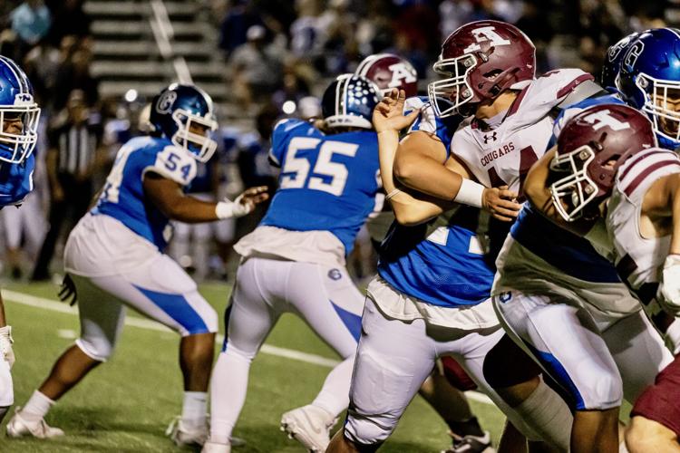 Cougars surge past Glenpool in district road game Sports