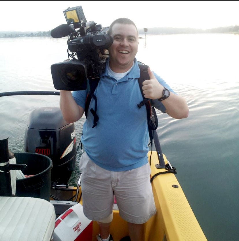 tv reporter and cameraman shot
