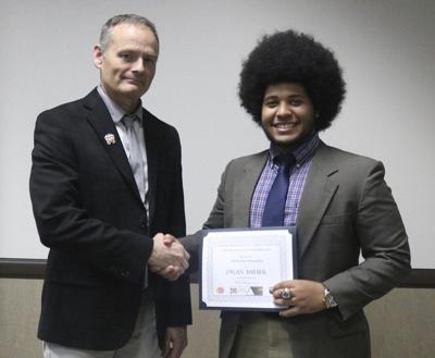 Barber receives two scholarships