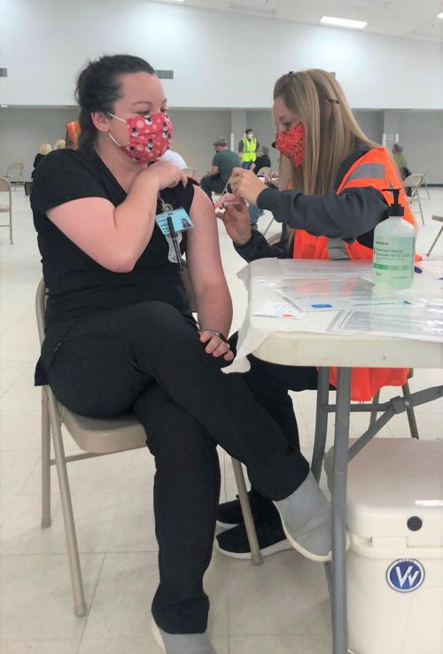 ECU Nursing students assisting with Covid-19 vaccinations