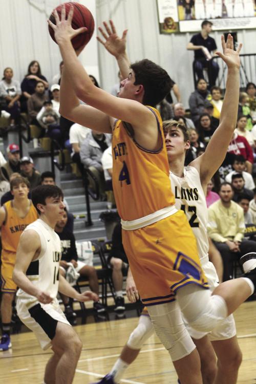Arab's Brooks Malone takes it to the basket