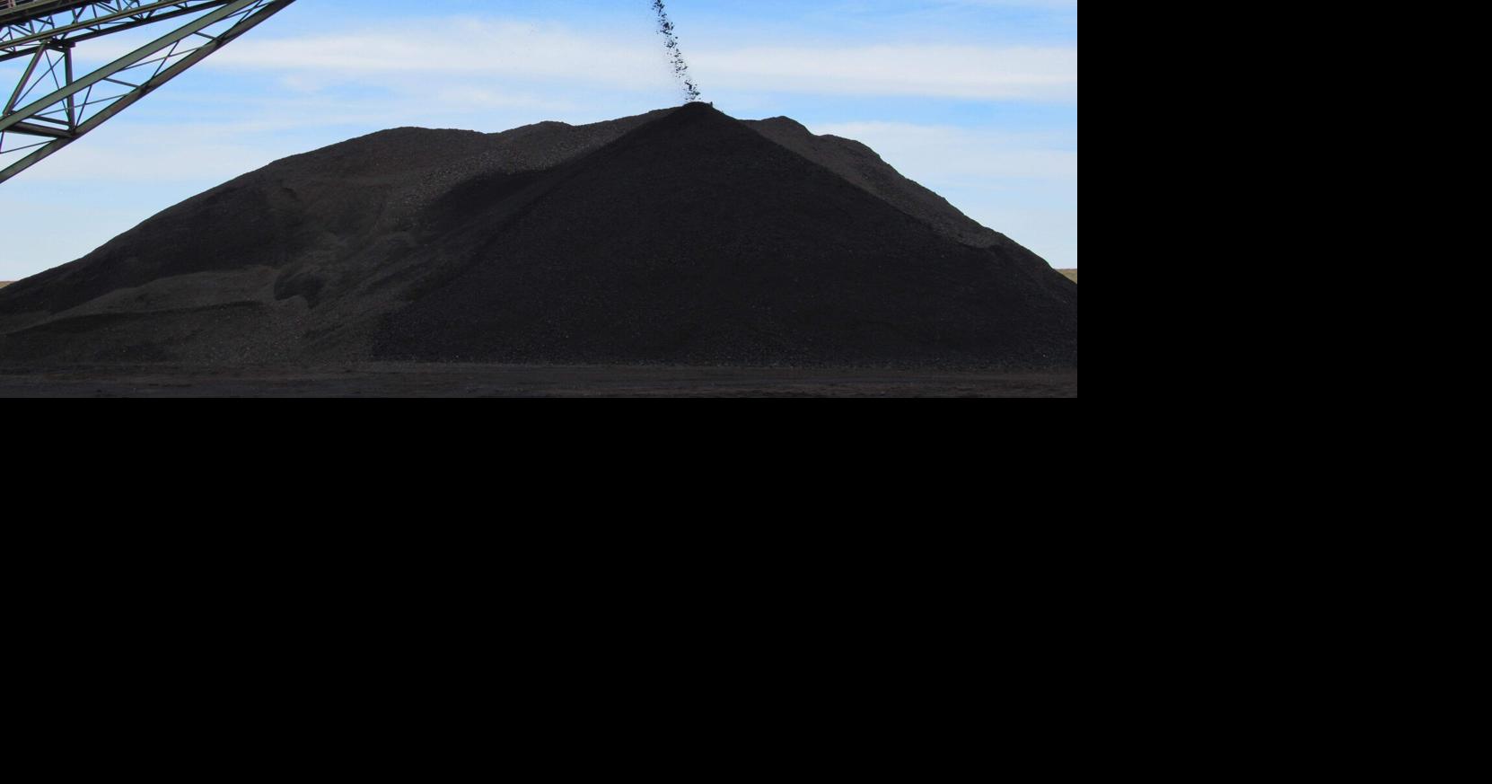 Coal produced at an underground mine in Kentucky poured from the end of a conveyor onto a pile being used to load trucks in December 2018.