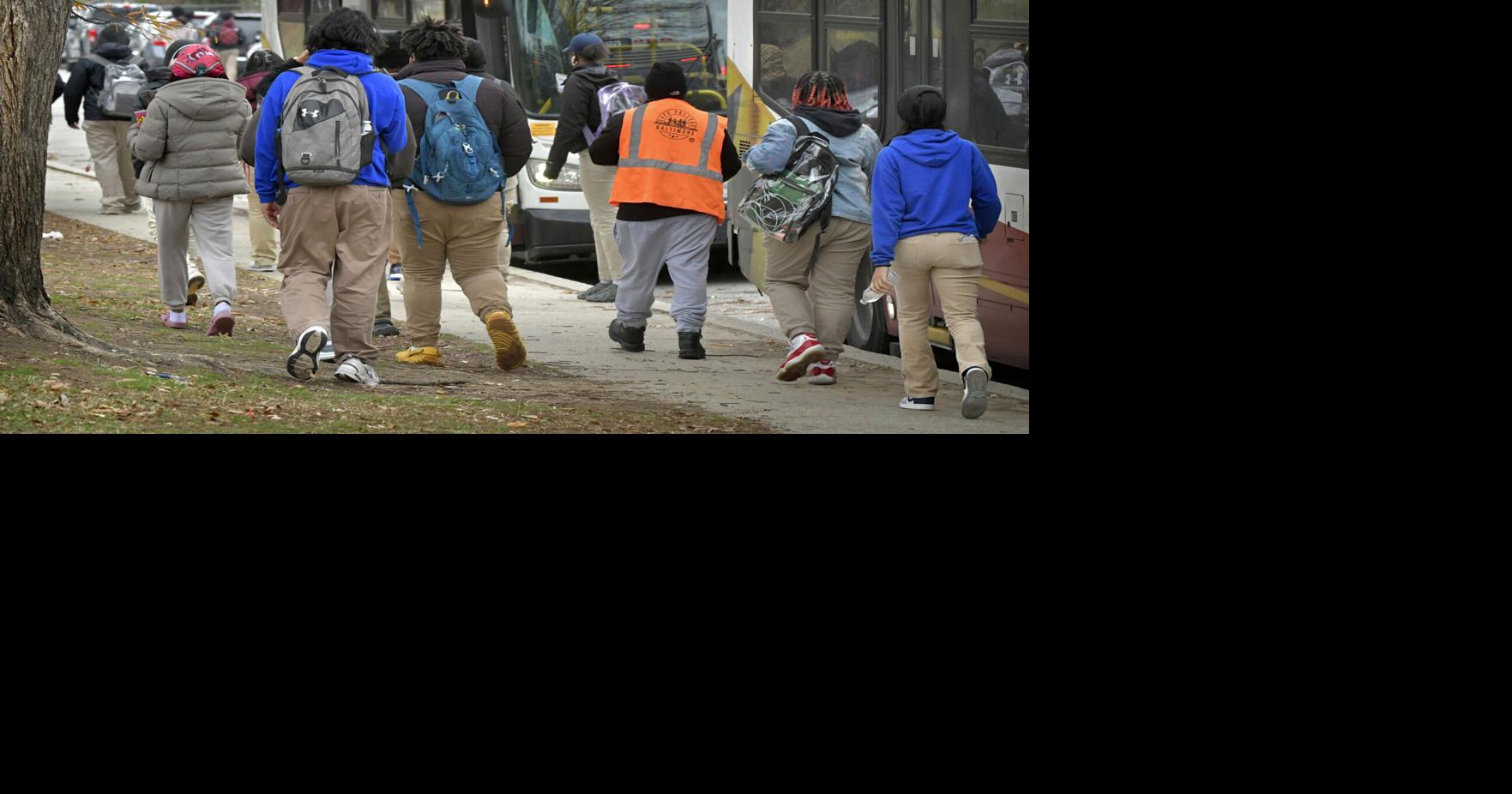 Students at Merganthaler Vocational-Technical High School board MTA buses at the end of a school day in 2024.