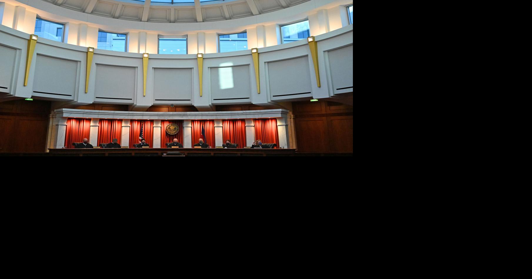 The Colorado Supreme Court hears public feedback at the Ralph Carr Judicial Center in Denver on Dec. 7, 2021.