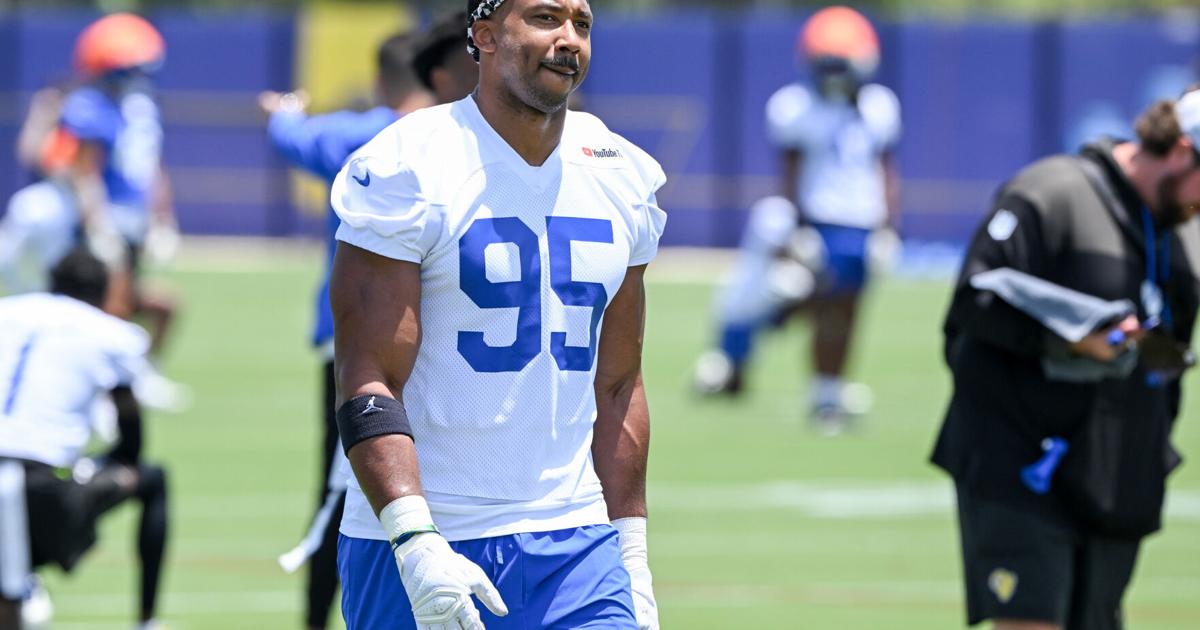 Newly acquired Los Angeles Rams defensive end Myles Garrett walks on the field during an OTA practice June 8, 2026, in Woodland Hills, Calif..