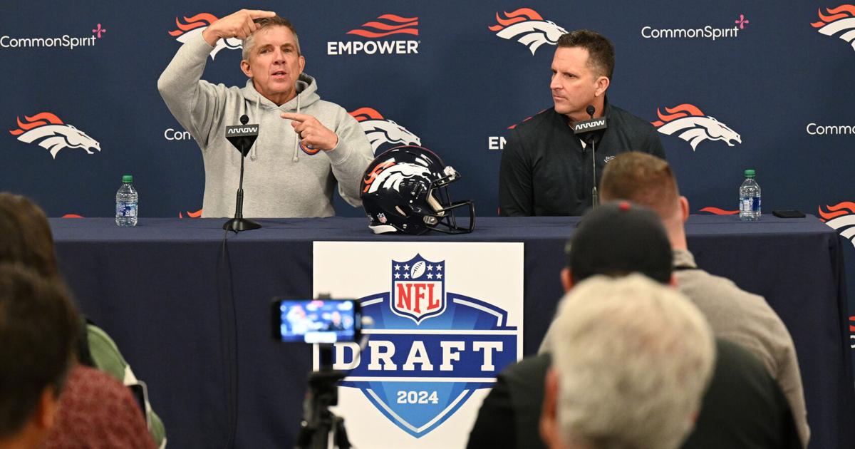 Denver Broncos head coach Sean Payton, left, and general manager George Paton talk to media during a pre-draft press conference on in Englewood, Colo., on April 18, 2024.