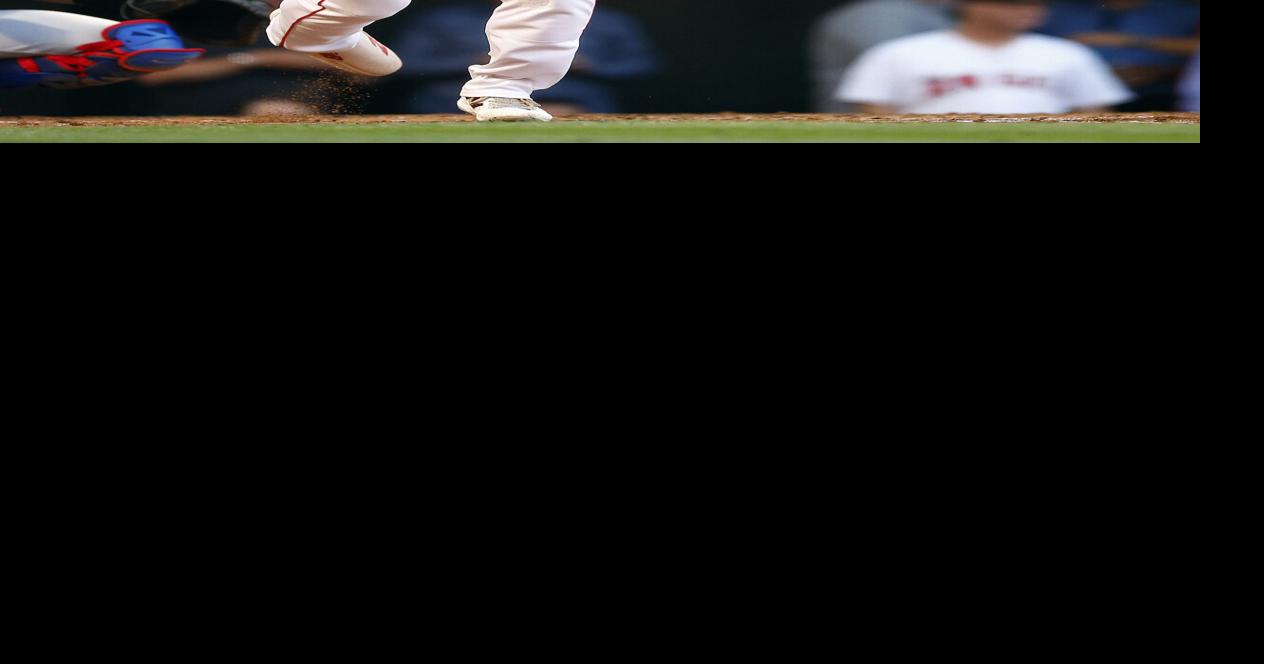 Los Angeles Angels' Shohei Ohtani runs his fingers through his hair during  the first inning of a baseball game against the Chicago Cubs Thursday, June  8, 2023, in Anaheim, Calif. (AP Photo/Mark