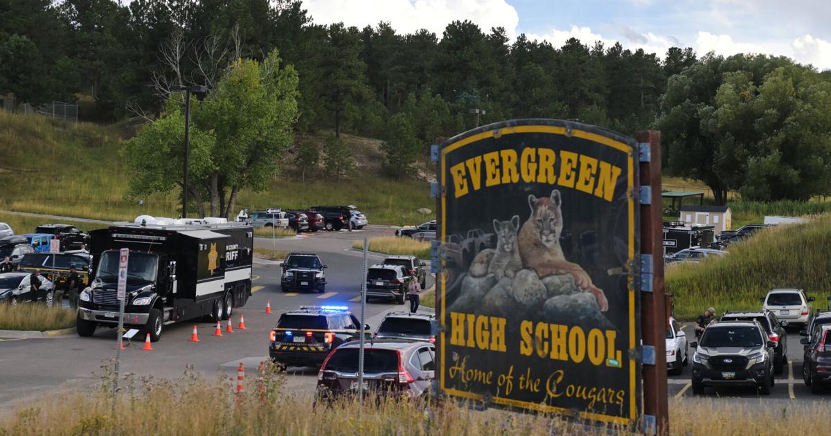 An investigation continues at Evergreen High School in Evergreen, Colo., on Sept. 10, 2025, after a student opened fire and wounded two classmates before killing himself.