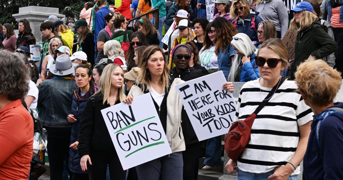 Here 4 the Kids, a group of mostly moms, stage a sit-in in 2023 asking for an executive order to ban guns in Colorado on June 5, 2023, in Denver.