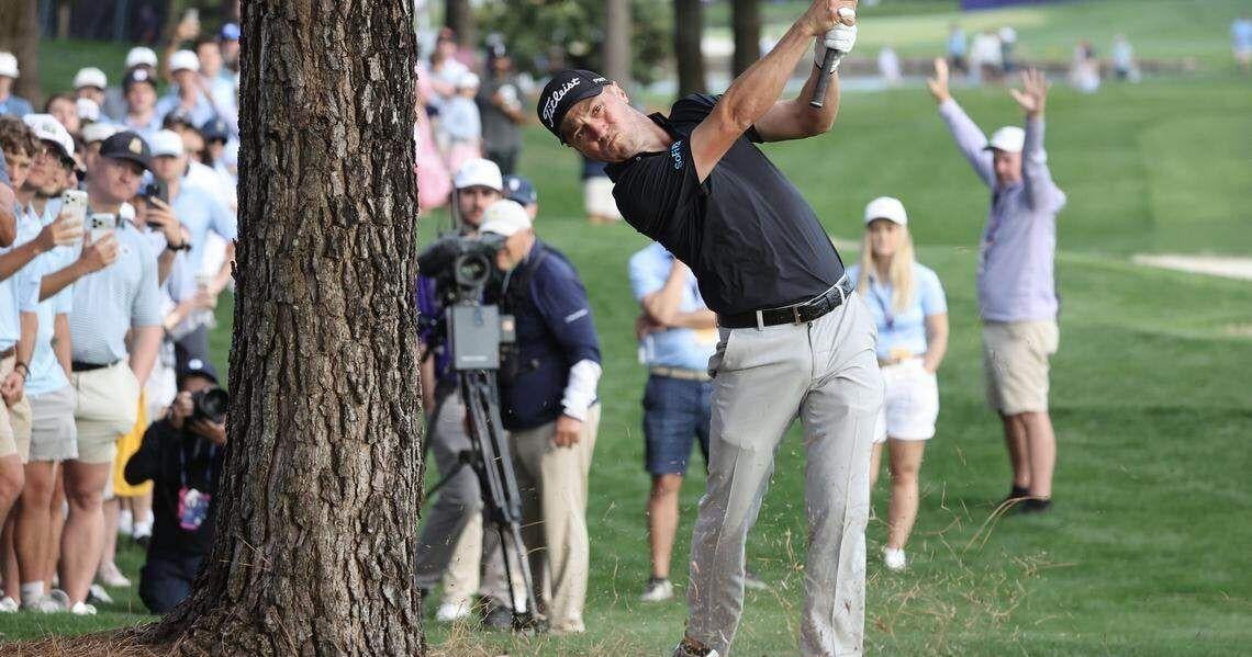 Justin Thomas of Kentucky hits from beneath the trees Saturday, May 9 at the 2026 Truist Championship at Quail Hollow Club in Charlotte.