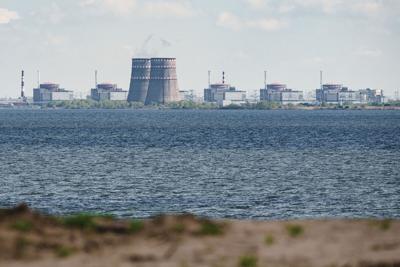 A general view shows the Zaporizhzhia nuclear power plant, situated in the Russian-controlled area of Enerhodar, seen from Nikopol in April 27, 2022.