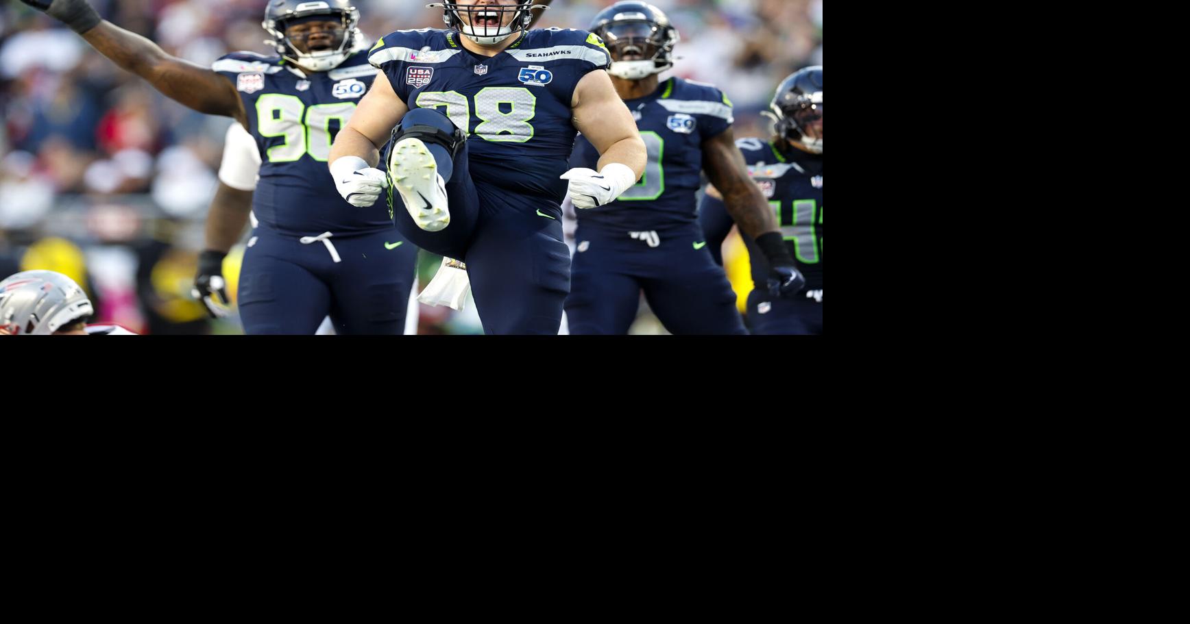 Seattle Seahawks defensive tackle Rylie Mills celebrates his sack on New England Patriots quarterback Drake Maye in the second during Super Bowl LX Sunday, Feb. 8, 2026, at Levi’ s Stadium in Santa Clara, California.
