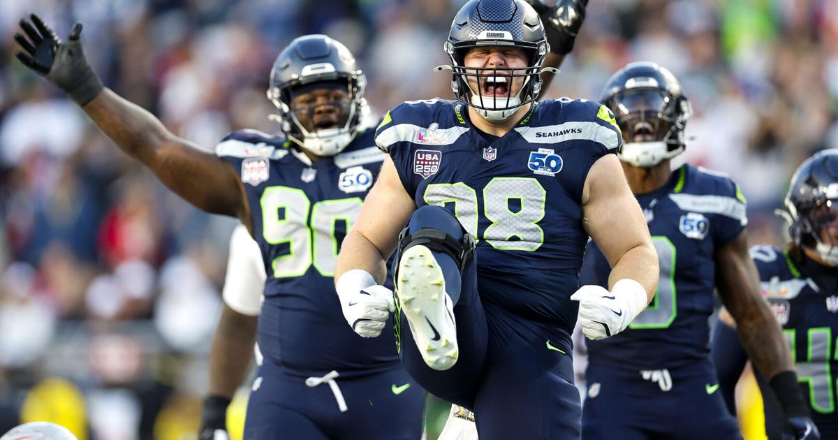 Seattle Seahawks defensive tackle Rylie Mills celebrates his sack on New England Patriots quarterback Drake Maye in the second during Super Bowl LX Sunday, Feb. 8, 2026, at Levi’ s Stadium in Santa Clara, California.